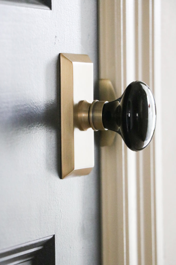 brass hardware porcelain black knob