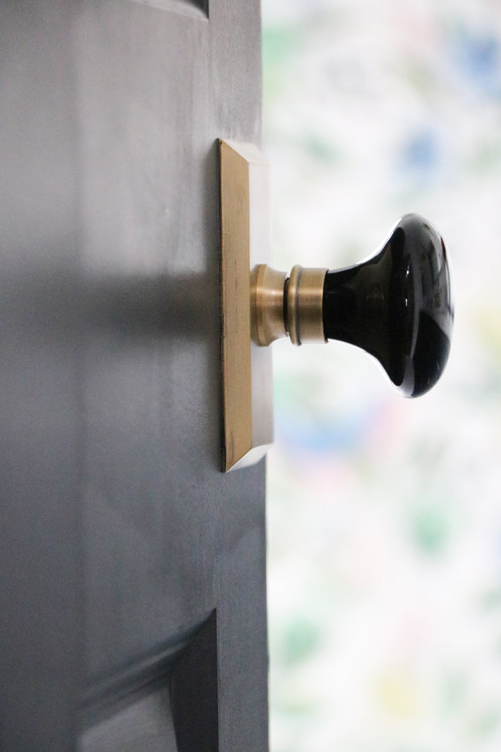 brass hardware porcelain black knob