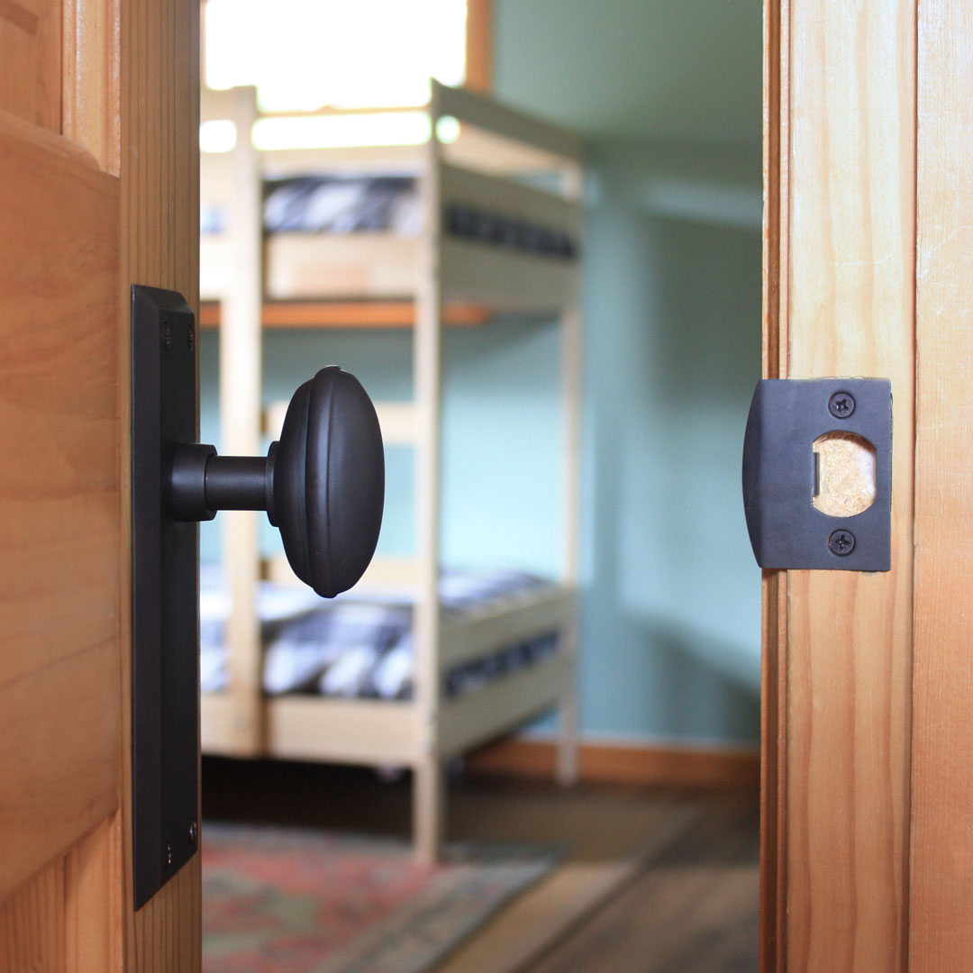 wood door with bronze hardware